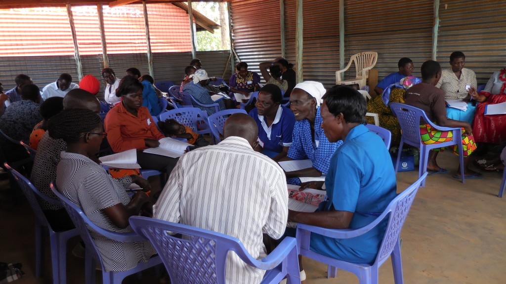 Bondo seminar participants work through the Seminar Bible study together 