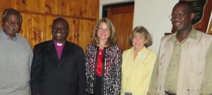 Kabale, Uganda -- Meeting with Bishop George of Kigezi Diocese. Canon Jovahn, Bishop George, Carrie, Donell, Frank