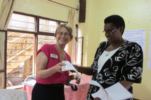 Carrie and Rev. Yvette, meeting with bishops' representatives in Bujumbura