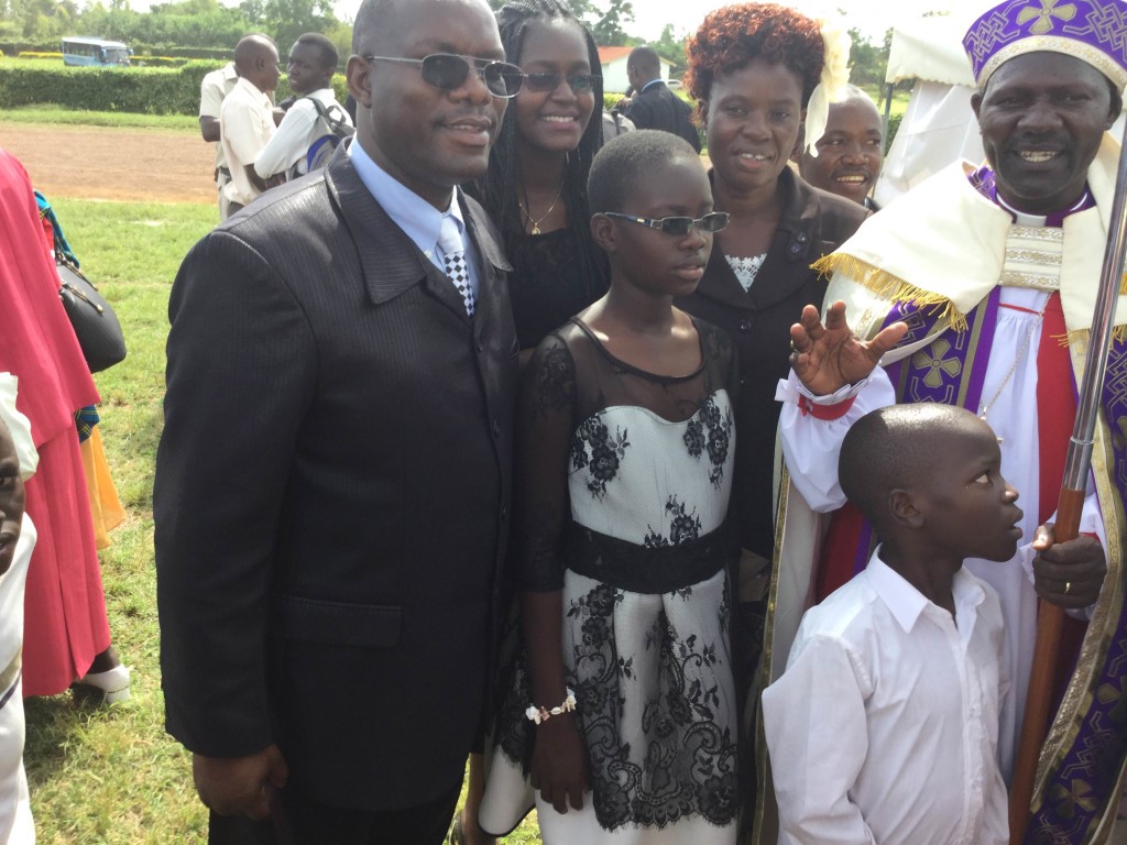 Frank with the bishop and his family.