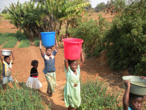 girls carrying water-001