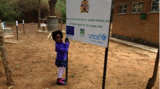 While on a tour of Rochelle’s “Demonstration Project,” the Holm’s daughter Mphatso explained the particulars of Rochelle’s work as the Manager of the Mzuzu University Centre of Excellence in Water and Sanitation where she leads the effort to network regional water and sanitation work and also the training of professionals through Mzuzu University.