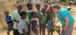 Sue Kerrigan with children in Malawi