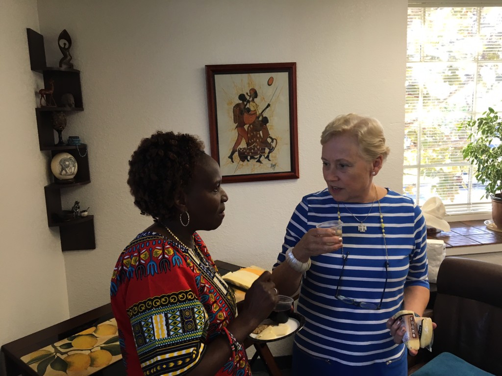 Advisory board member Susan Njemanze and board member Linda Ikeda chat at the new office open house.